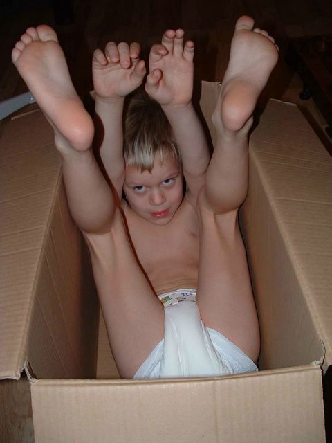 6 year old boy 7 year old boy wearing plastic backed diaper