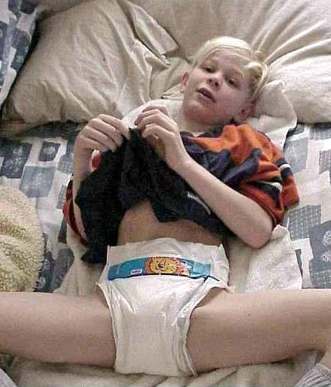9 to 10 year old boy wearing plastic pampers