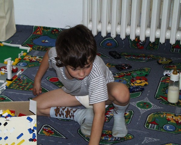 8 year old boy wearing plastic pampers tommy diaper boy kid