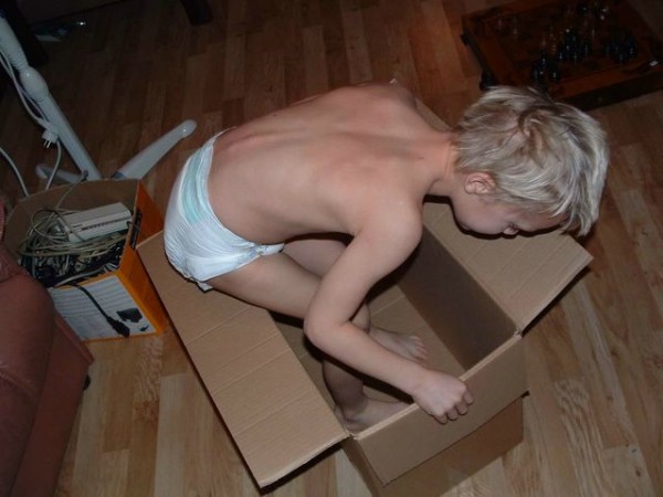 6 year old 7 year old boy wearing just plastic backed diaper