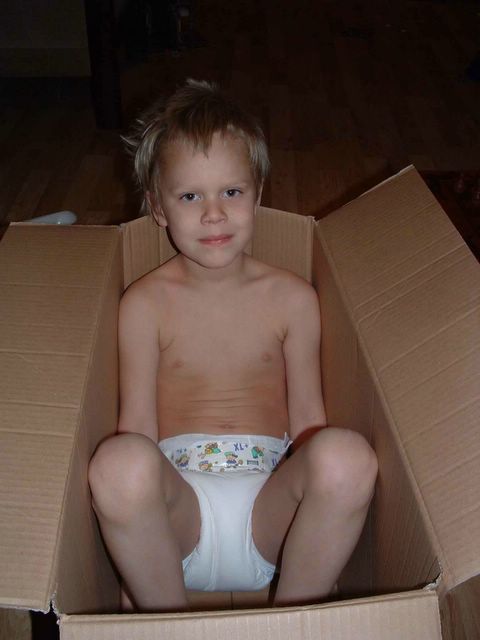 7 year old diaper boy wearing plastic diapers
