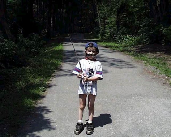 Diaper Boy Tommy wearing just diaper and shirt outside