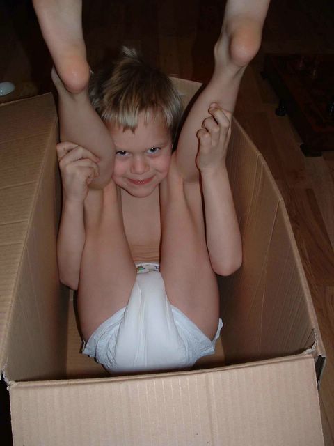 6 year old boy 7 year old boy wearing plastic backed diaper