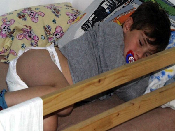 8 year old diaper boy tommy pampers pacifier