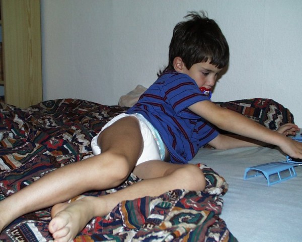 8 year old diaper boy Tommy wearing diapers